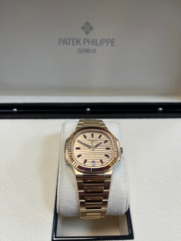 patek-philippe-nautilus-automatic-rose-gold-baguette-cognac-bezel-71181300r-001-295794.jpg Patek Philippe Nautilus Automatic Rose Gold Baguette Cognac Bezel 7118/1300R-001