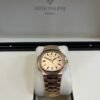 patek-philippe-nautilus-automatic-rose-gold-baguette-cognac-bezel-71181300r-001-746619.jpg Patek Philippe Nautilus Automatic Rose Gold Baguette Cognac Bezel 7118/1300R-001