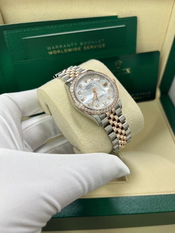 rolex-datejust-31mm-mother-of-pearl-dial-rose-gold-steel-reference-278381rbr-850844.jpg Rolex Datejust 31mm Mother Of Pearl Dial Rose Gold / Steel Reference #278381RBR