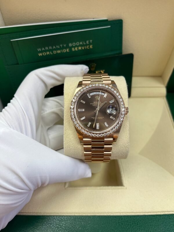 rolex-everose-gold-day-date-40-watch-everose-gold-bezel-chocolate-baguette-diamond-dial-president-bracelet-ref228345rbr-255752.jpg Rolex Everose Gold Day-Date 40 Watch - Everose Gold Bezel - Chocolate Baguette Diamond Dial - President Bracelet (REF#228345RBR)