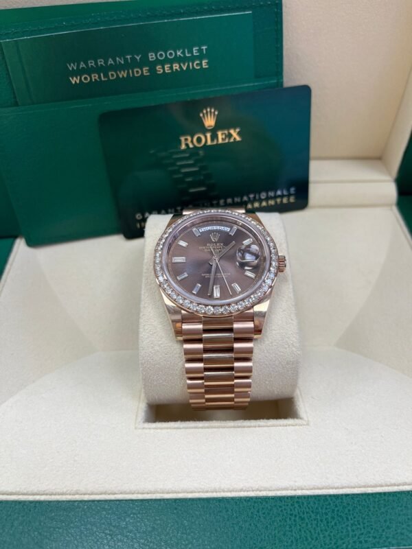 rolex-everose-gold-day-date-40-watch-everose-gold-bezel-chocolate-baguette-diamond-dial-president-bracelet-ref228345rbr-473579.jpg Rolex Everose Gold Day-Date 40 Watch - Everose Gold Bezel - Chocolate Baguette Diamond Dial - President Bracelet (REF#228345RBR)