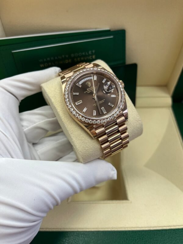 rolex-everose-gold-day-date-40-watch-everose-gold-bezel-chocolate-baguette-diamond-dial-president-bracelet-ref228345rbr-504590.jpg Rolex Everose Gold Day-Date 40 Watch - Everose Gold Bezel - Chocolate Baguette Diamond Dial - President Bracelet (REF#228345RBR)