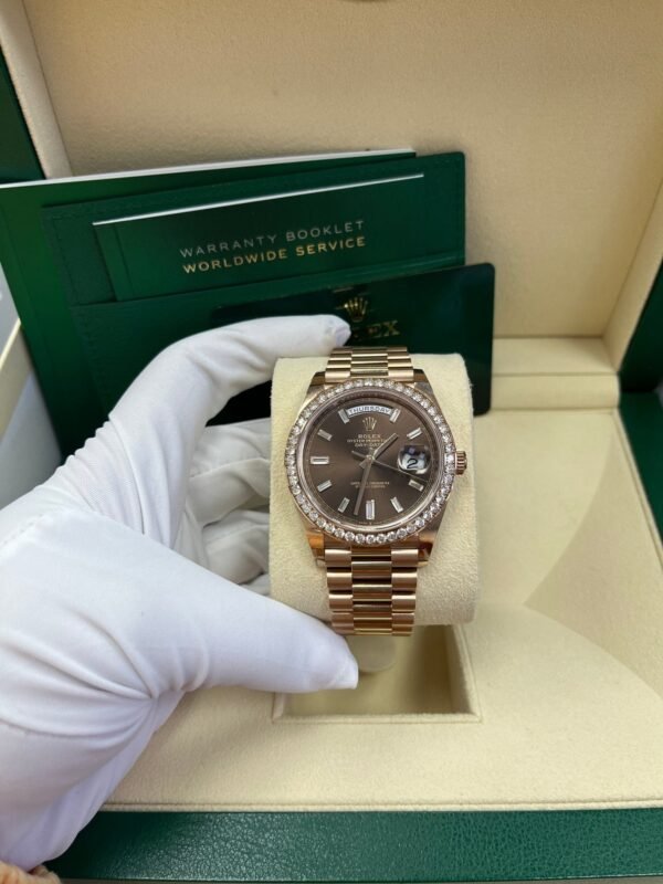rolex-everose-gold-day-date-40-watch-everose-gold-bezel-chocolate-baguette-diamond-dial-president-bracelet-ref228345rbr-810929.jpg Rolex Everose Gold Day-Date 40 Watch - Everose Gold Bezel - Chocolate Baguette Diamond Dial - President Bracelet (REF#228345RBR)