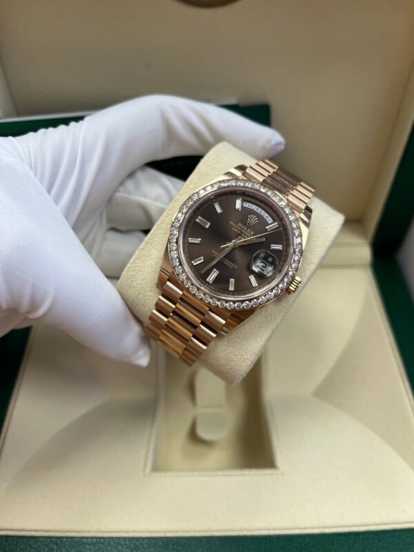 rolex-everose-gold-day-date-40-watch-everose-gold-bezel-chocolate-baguette-diamond-dial-president-bracelet-ref228345rbr-878441.jpg Rolex Everose Gold Day-Date 40 Watch - Everose Gold Bezel - Chocolate Baguette Diamond Dial - President Bracelet (REF#228345RBR)