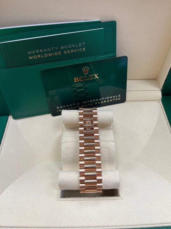 rolex-everose-gold-day-date-40-watch-everose-gold-bezel-chocolate-baguette-diamond-dial-president-bracelet-ref228345rbr-990828.jpg Rolex Everose Gold Day-Date 40 Watch - Everose Gold Bezel - Chocolate Baguette Diamond Dial - President Bracelet (REF#228345RBR)